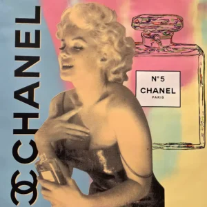Retro glamorous woman holding Chanel No.5 bottle