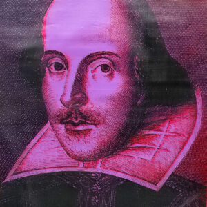 Tinted historic portrait of man in ruff collar